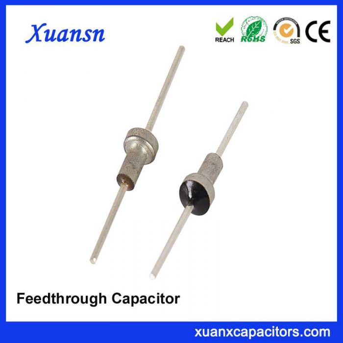 Welded feedthrough capacitor